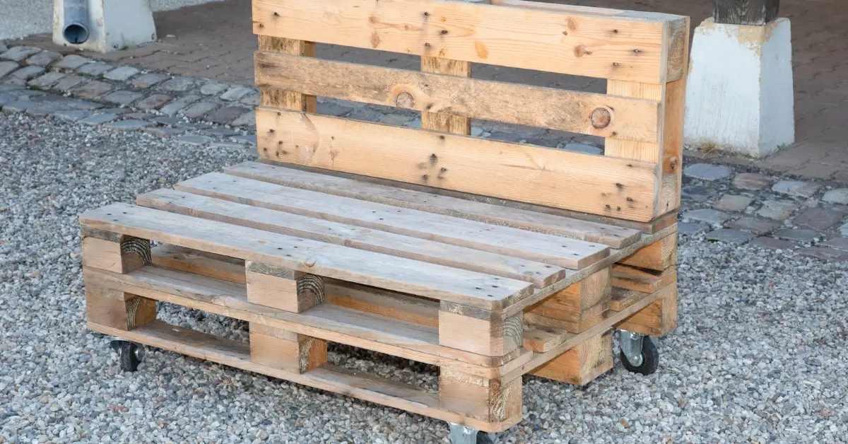 A garden bench made from wooden pallets