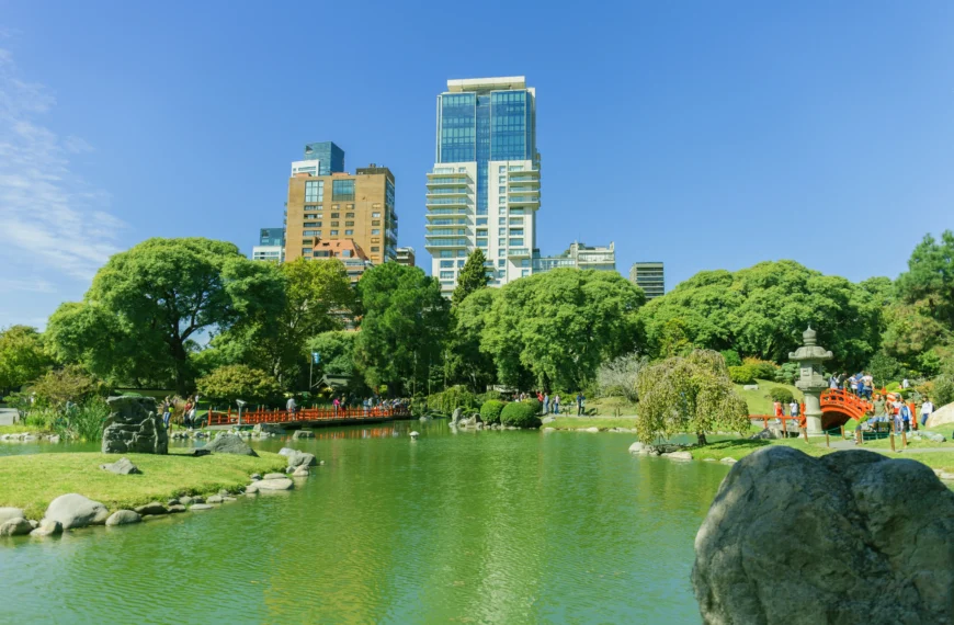 Japanese Garden Buenos Aires View of the lake, the red bridge and the skyscrapers in the background